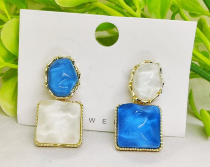 Elegant Blue And White Resin Statement Earrings Timeless Design With A Modern Twist